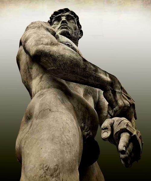 Low-angle view of a muscular bearded classical statue with hands wrapped in ancient combat gloves